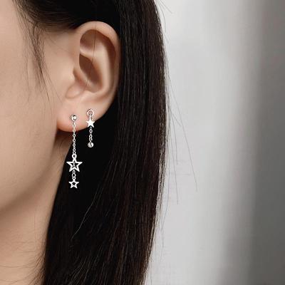 Gu Maoning 2025 Trendy Hollow Star Tassel Earrings - Fashion for Women & Students.