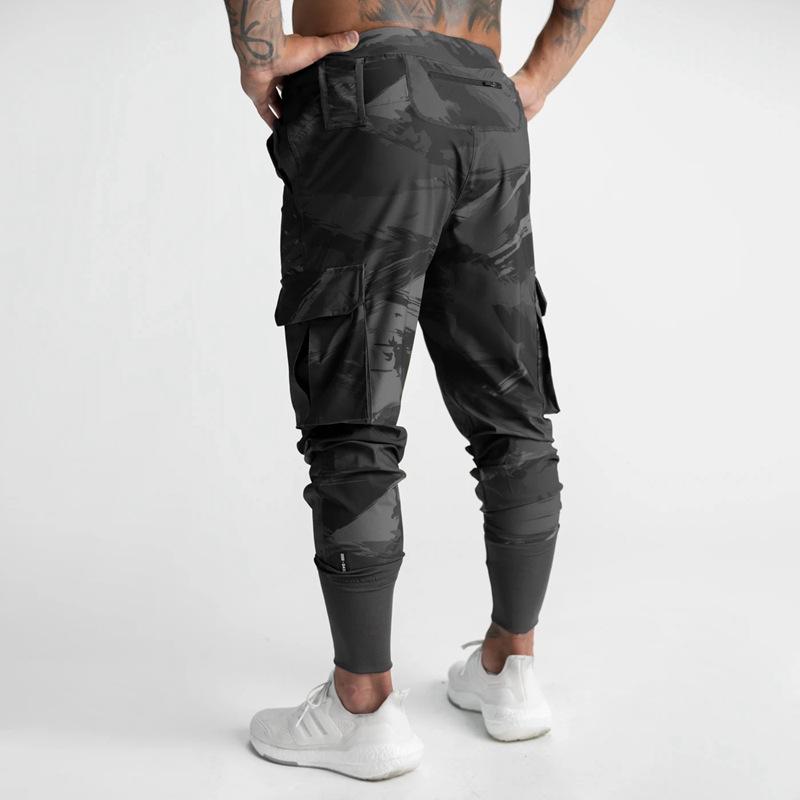 Pantalon de survêtement tissé athlétique décontracté pour homme pour la course et l'entraînement