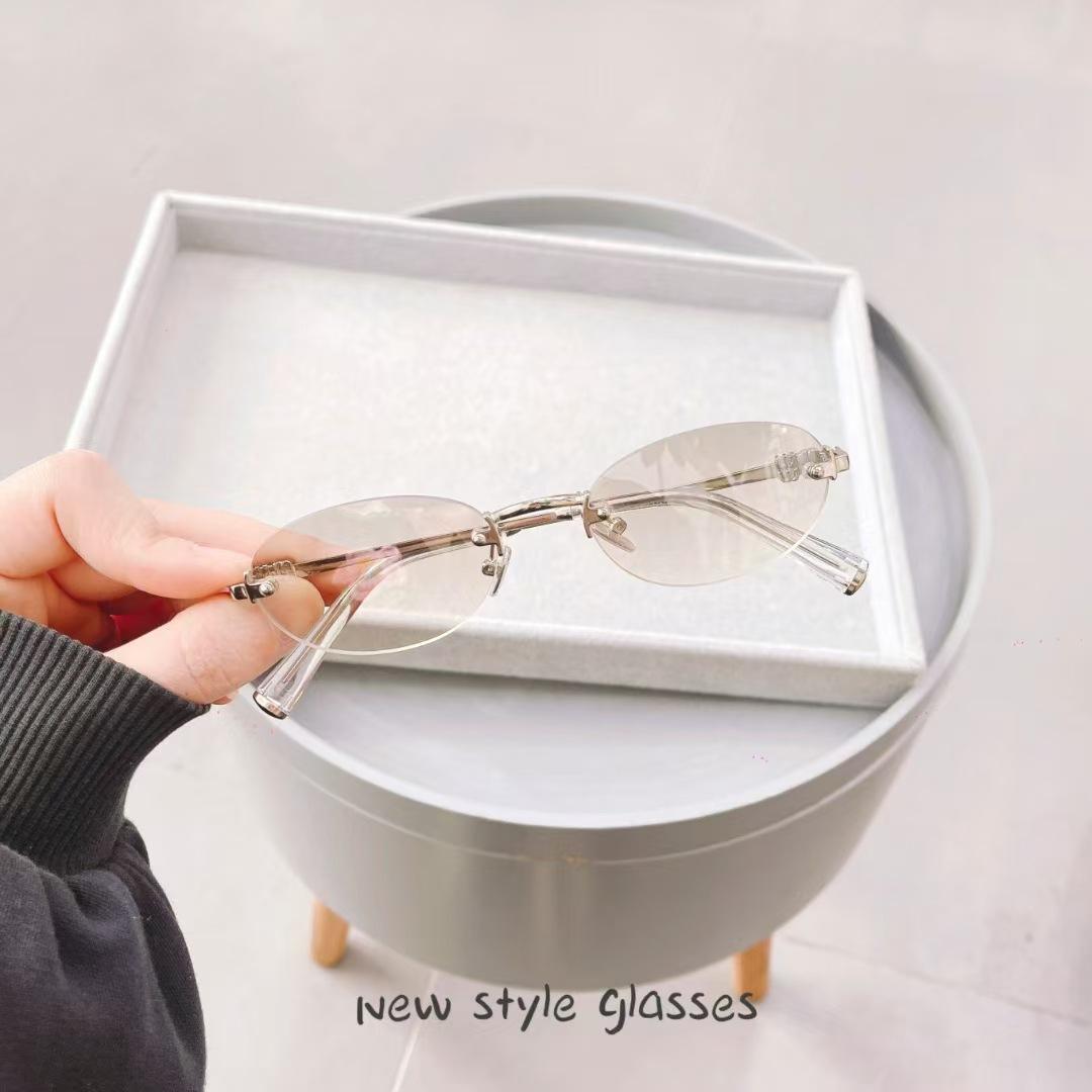 

Oval Shape Rimless Men s Sun Glasses New Style Anti-glare Sunglasses for Women Fashion Trendy Woman Sun Glass