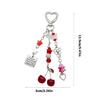 Modern Cherry Themed Keychain Accessory Crafted From Sturdy Materials Perfect For Adding Flair To Any Ensembles