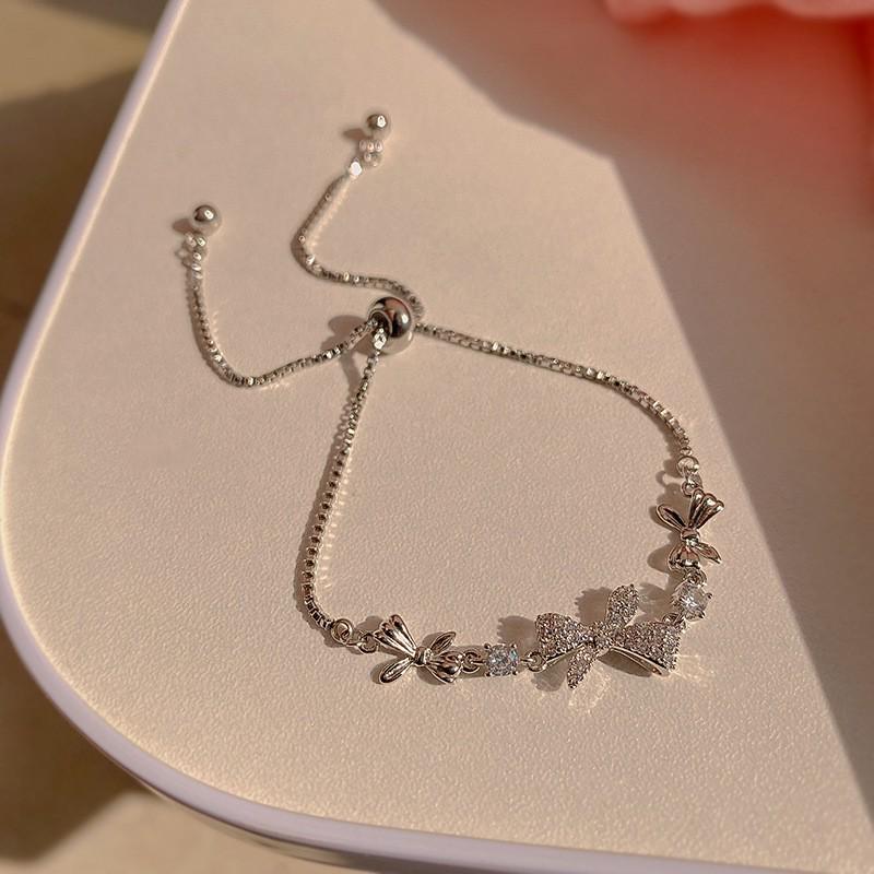 

2024 High-End Women s Bow Drawstring Zircon Bracelet - Luxurious Niche Design