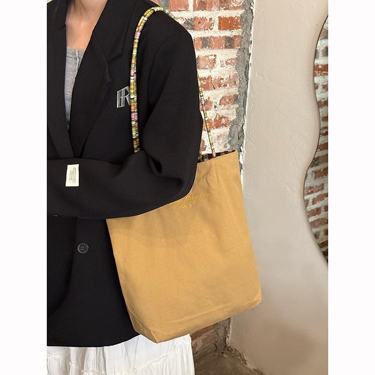 Korean double-sided plaid shoulder tote bag, new niche large-capacity canvas bag, premium commuter armpit bag