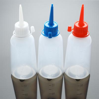 Flacon aplicator cu vârf din plastic transparent de 100 ml. Flacon de stoarcere din plastic cu capac