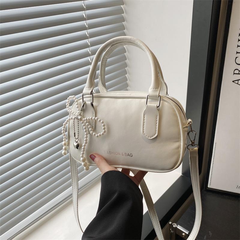 Summer new beautiful fashion trend pillow bag solid color simple commuting casual portable shoulder messenger bag