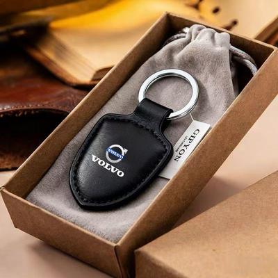 Skórzany Brelok do Kluczy Samochodowych Typu Tarcza z Emblematem Breloczek Do EX30 XC60 XC40 V60 V40 XC90 XC70 V50 S60 V70 S90 Olestar AWD S80 V90