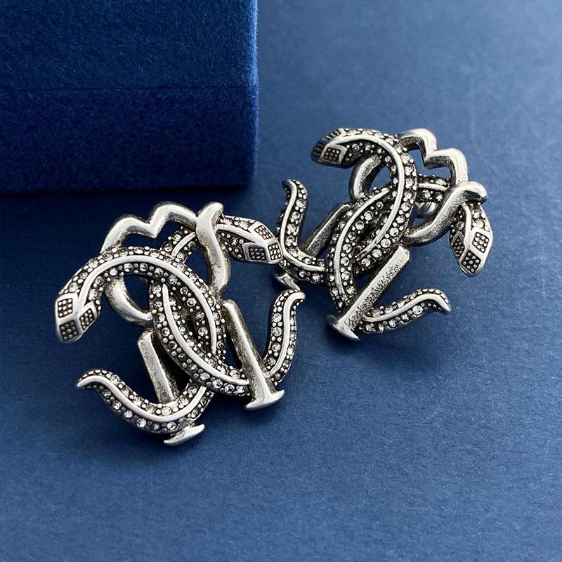 

Серьги-гвоздики в стиле ретро с двойной змеей, американские хип-хоп-серьги в стиле темной крутой змеи для мужчин и женщин