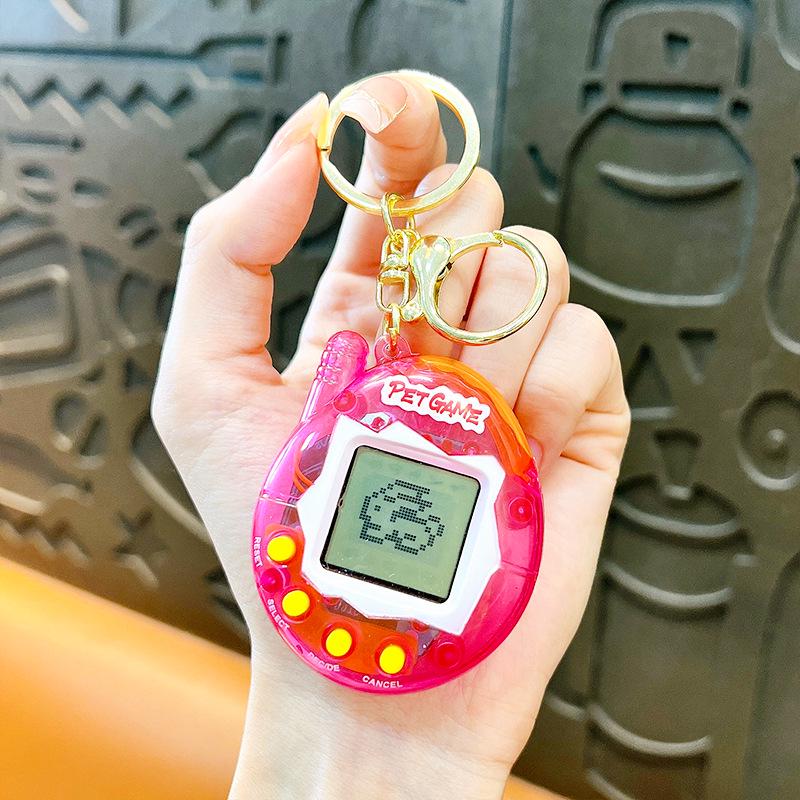 Breloc Creativ Mini Animal de Companie Electronic: Consolă de joc portabilă cu animal de companie virtual