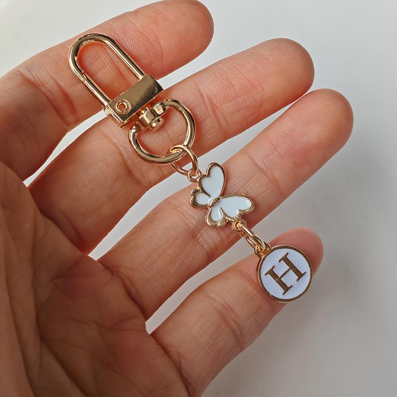 1 Stück Schlüssel-Logo Leichter Schlüsselanhänger Autoschlüssel Begleiter Taschenanhänger Langlebigkeit Metallschlüsselanhänger Monogramm-Anhänger Schmetterling Monogramm-Schlüsselanhänger