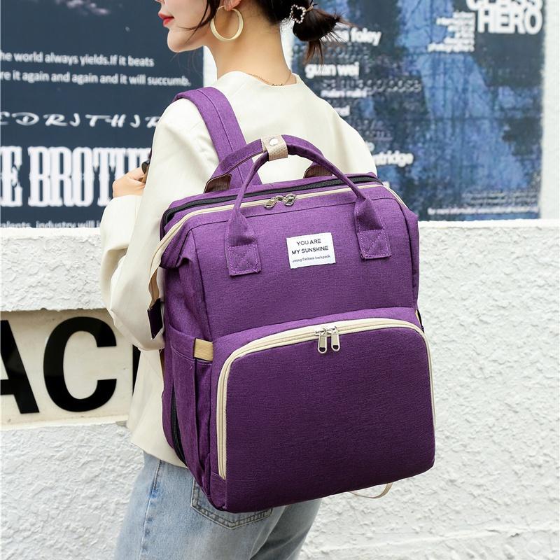 Neues faltbares Babybett mit Reisewiege und isolierter Tasche, 3-in-1-Wickeltaschen-Rucksack mit Wickelstation, tragbares Kinderbett mit Babytasche