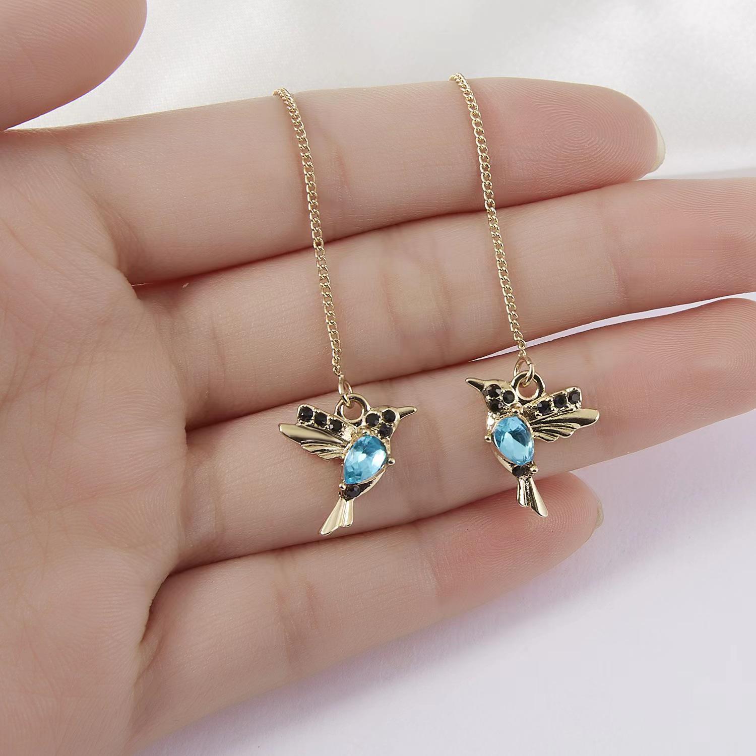 

Colorful Hummingbird Earrings - Cute, Long, Animal-Themed Accessories for Women синий