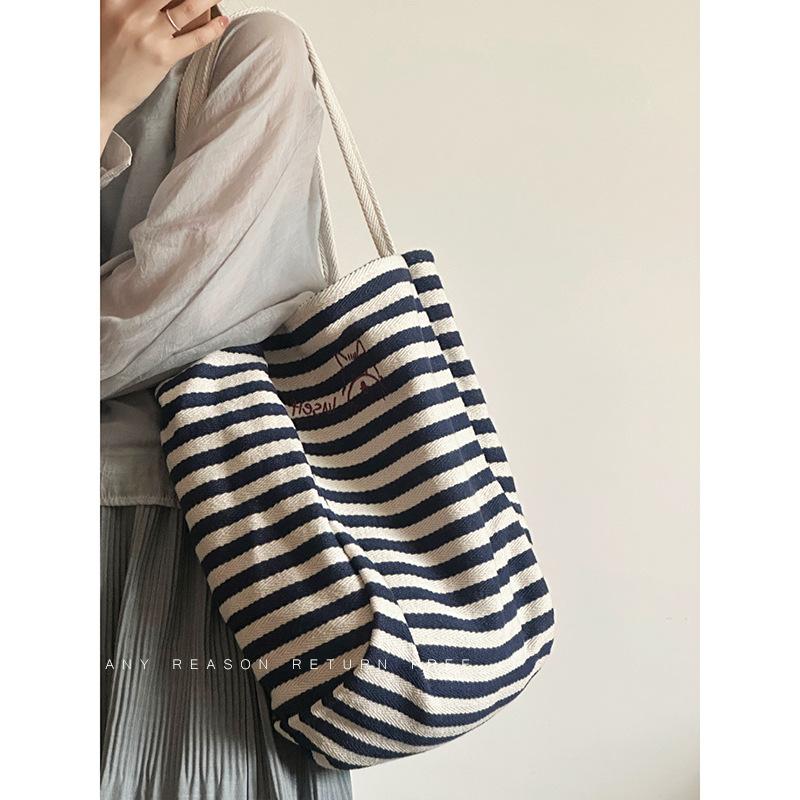 

Bag Women s 2025 New Striped Canvas Bag Student Leisure Commuter Large Capacity Portable Shoulder Bag синий