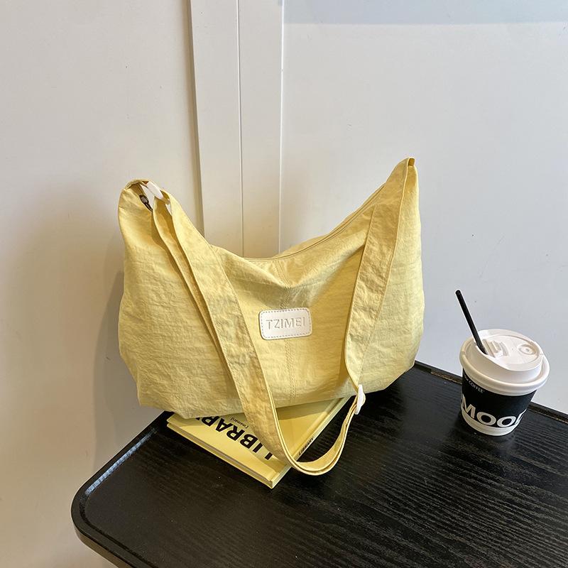 

Wenyi style canvas bag women s new simple and large-capacity shoulder crossbody dumpling bag жёлтый