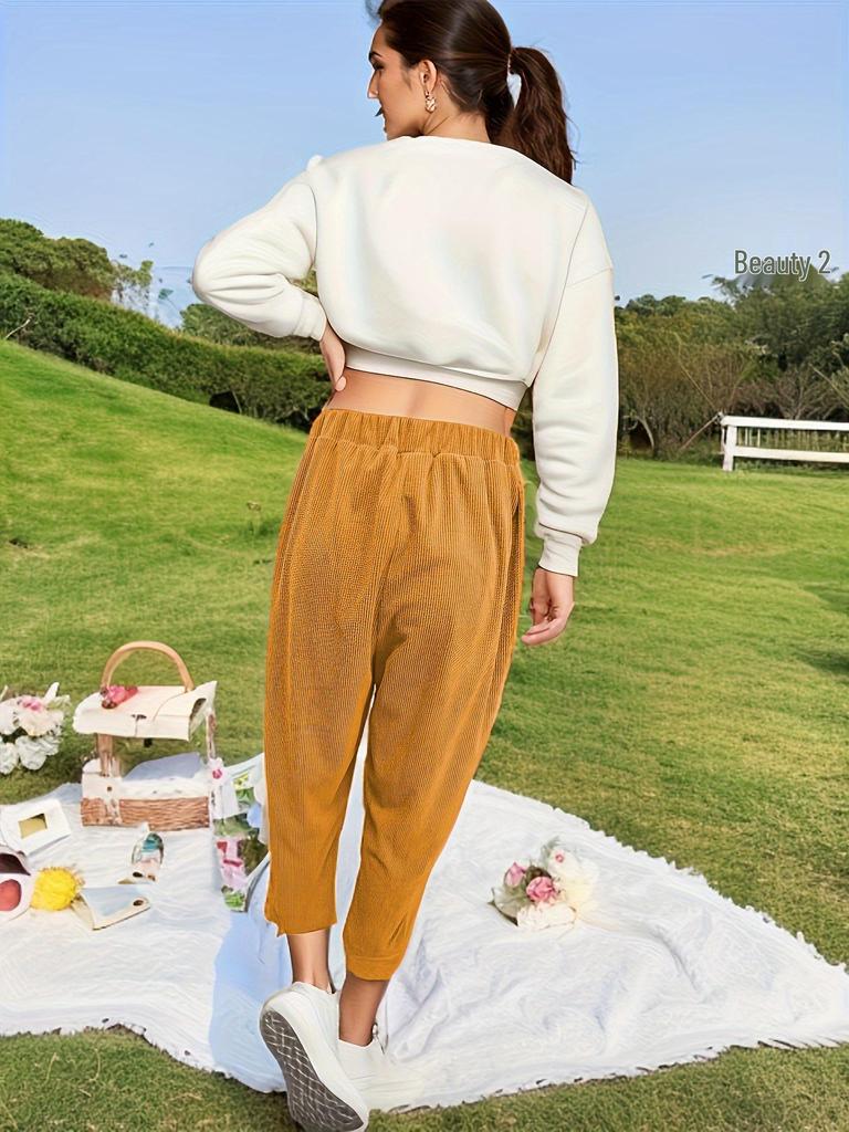 European & American Women's Corduroy Pants - Elastic Waist, Pocketed, Loose Fit, Tapered Leg, 2026 Autumn/Winter Collection