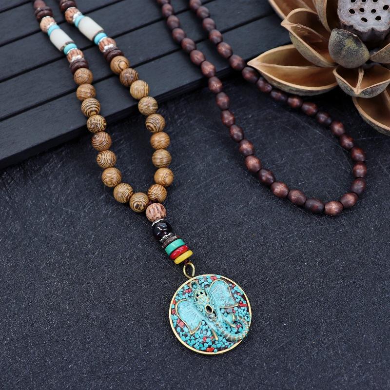 Collana unisex fatta a mano Nepal buddista Mala perline di legno ciondolo collana etnica pesce corno lunga dichiarazione