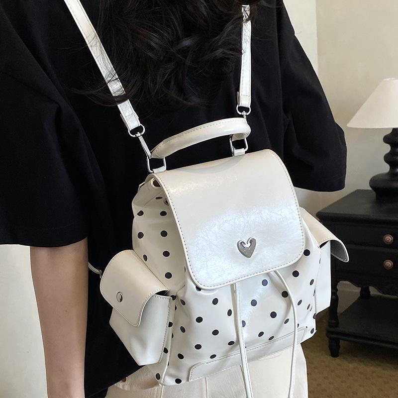 Schoolbag high value polka dot backpack 1011 summer new large capacity junior high school student schoolbag college student commuter backpack