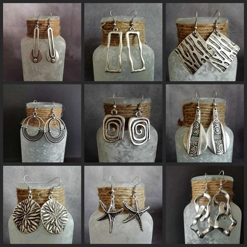 Beautiful And Exquisite Toys Women's New Vintage Ethnic Personality Vintage Geometry Long Hook Triangle Metal Spiral Earrings Jewelry Accessories