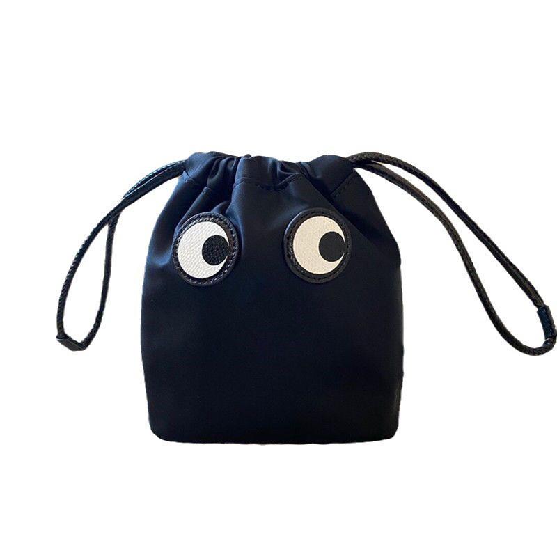 Cartoon Big Eyes Nylon Drawstring Handbag: Lightweight & Fashionable Mini Storage Bag