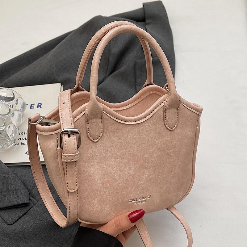 Korean niche design retro portable vegetable basket bag women's 2025 spring and summer hot sale fashion versatile commuter messenger bag