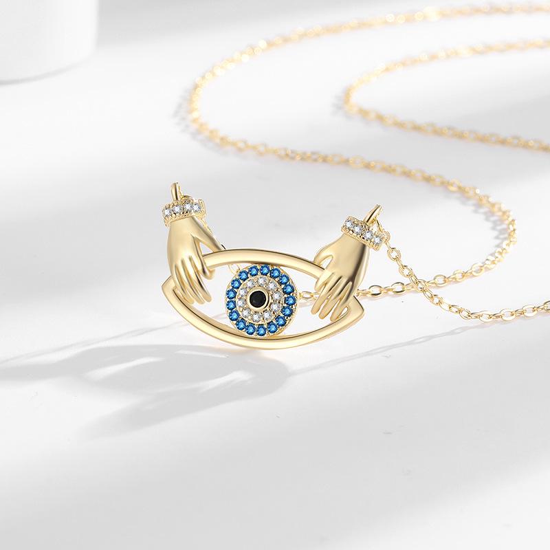 Elegant Devil's Eye Pendant Necklace for Women - European & American Fashion, Double Hand Hug Design, High-End Clavicle Chain