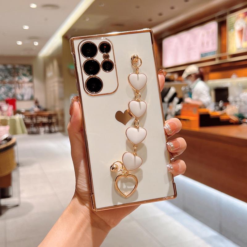 

Роскошный чехол-браслет с сердечком и покрытием для телефона Samsung S25 Ultra S24 FE S23 S22 S21 A16 A55 A35 A15 A54 A35, противоударный мягкий бампер из ТПУ Samsung S25 Ultra белый