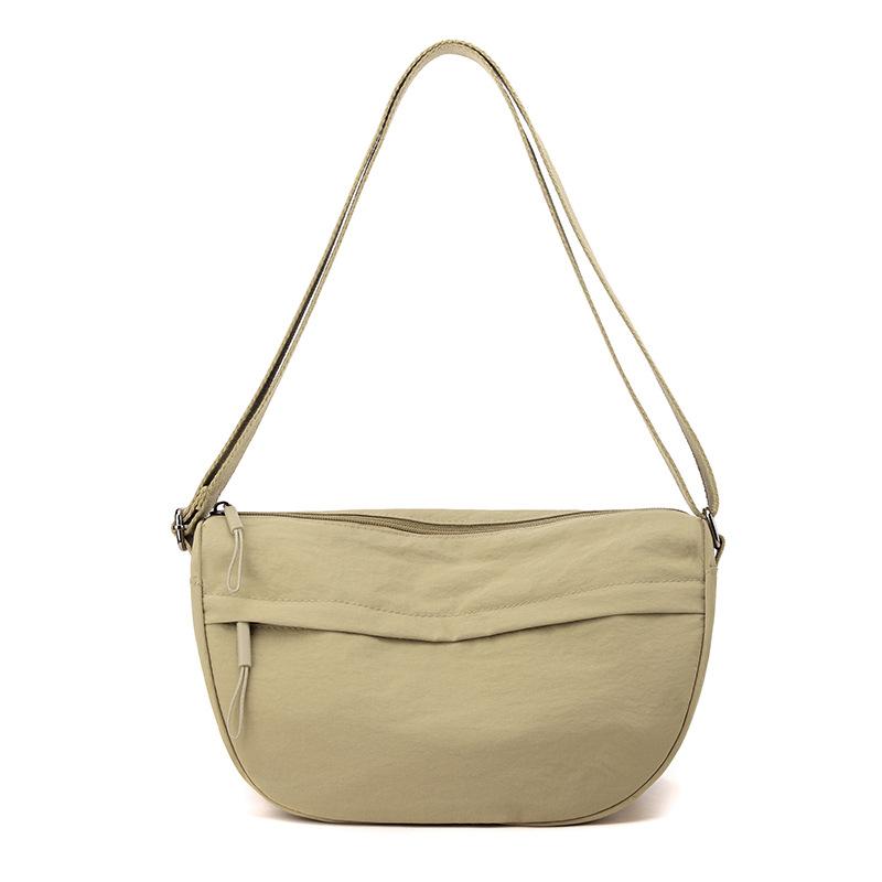 Korean Version of Solid Color Simple Messenger Bag Nylon Joker Leisure Saddle Bag Large Capacity Texture Commuter Portable Shoulder Bag.
