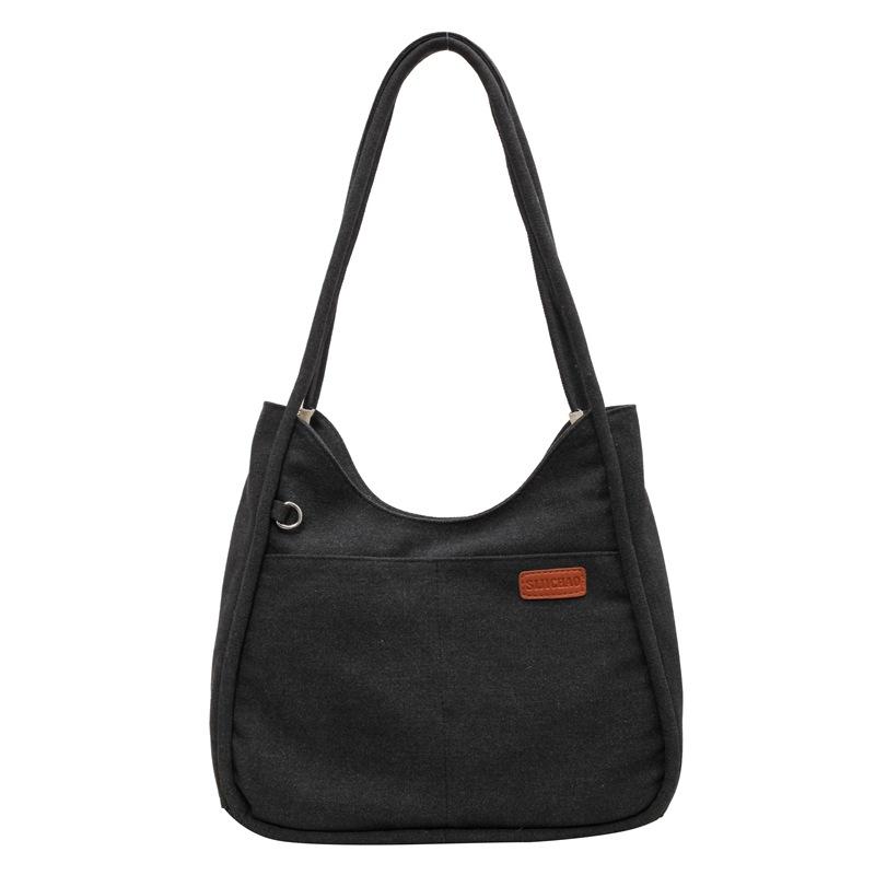 Simple niche canvas bag, new large-capacity women's retro shoulder bag, textured commuter shoulder underarm bag for women