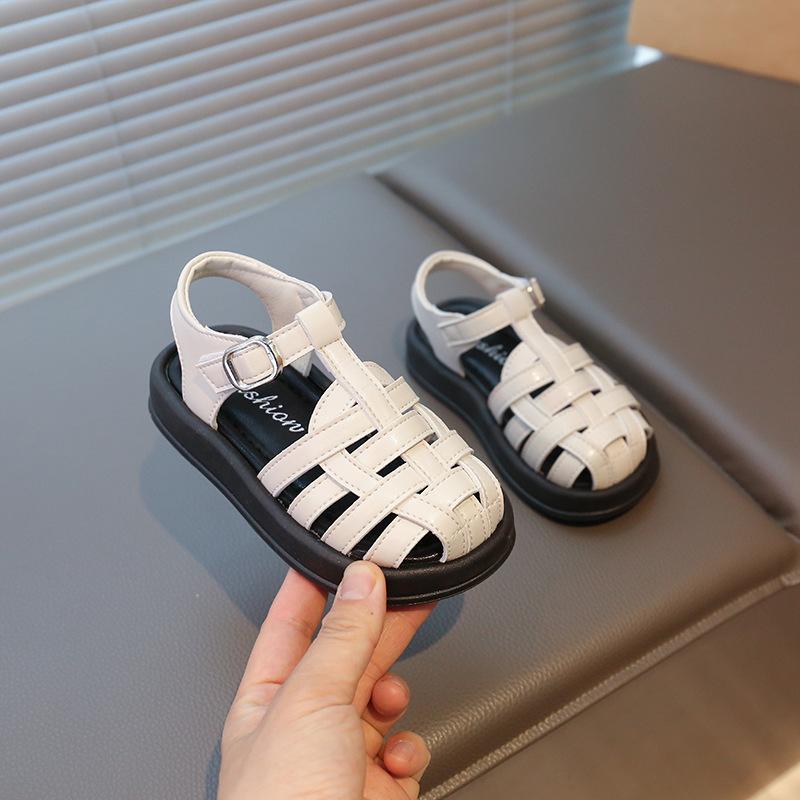 

Children s bag head sandals 2025 summer new children s anti-kick thick-soled hollow Roman shoes girls casual beach shoes 23