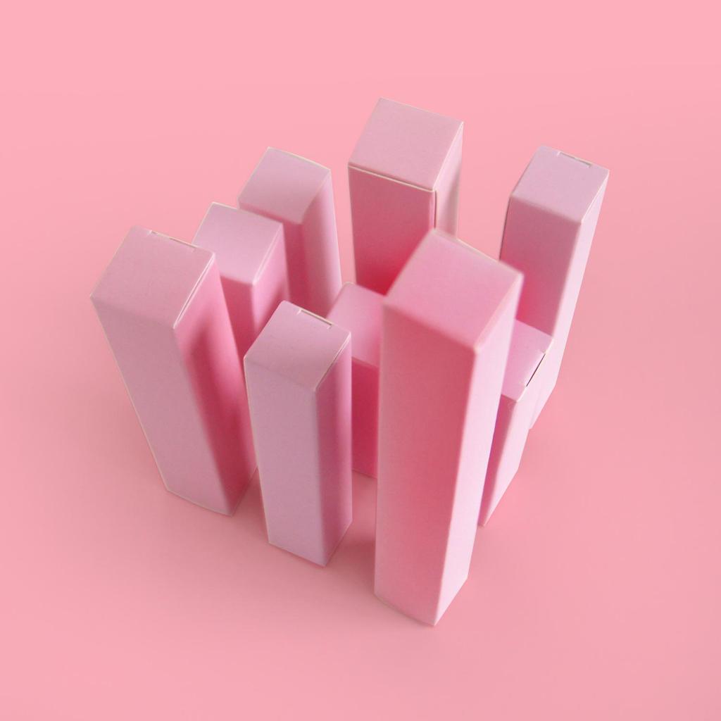 Niestandardowe pudełka na kosmetyki z białego kartonu: Opakowania do różowego eyelinera, szminki, balsamu do ust z opcjami druku