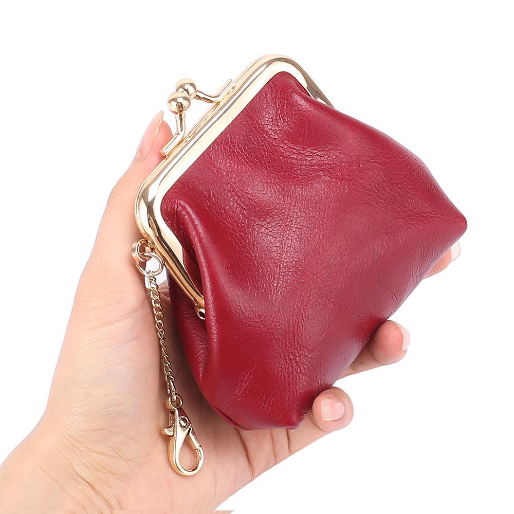 Retro clip change bag women's European and American, first layer oil wax cowhide Ins small earphones coin bag storage bag