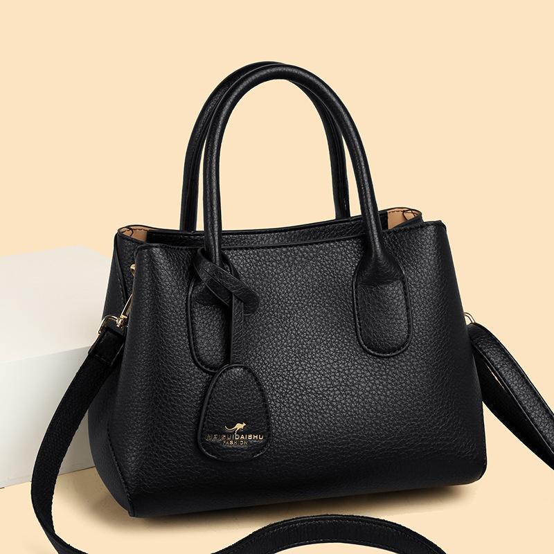 New women s bag fashionable commuter middle-aged mother portable tote bag large capacity messenger women s bag чёрный