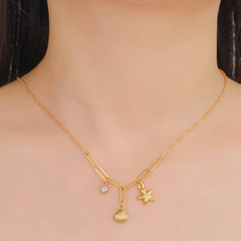 Cazador Stainless Steel Sea Shell Starfish Pendant Necklace for Women Gold Plated Chain Summer Jewelry Vacation Beach Gift