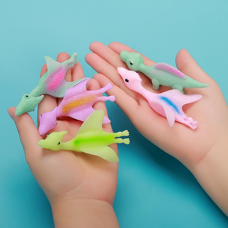 Dinosaur Finger Dart Toy: Launchable Soft Rubber Dinosaur for Stress Relief and Entertainment