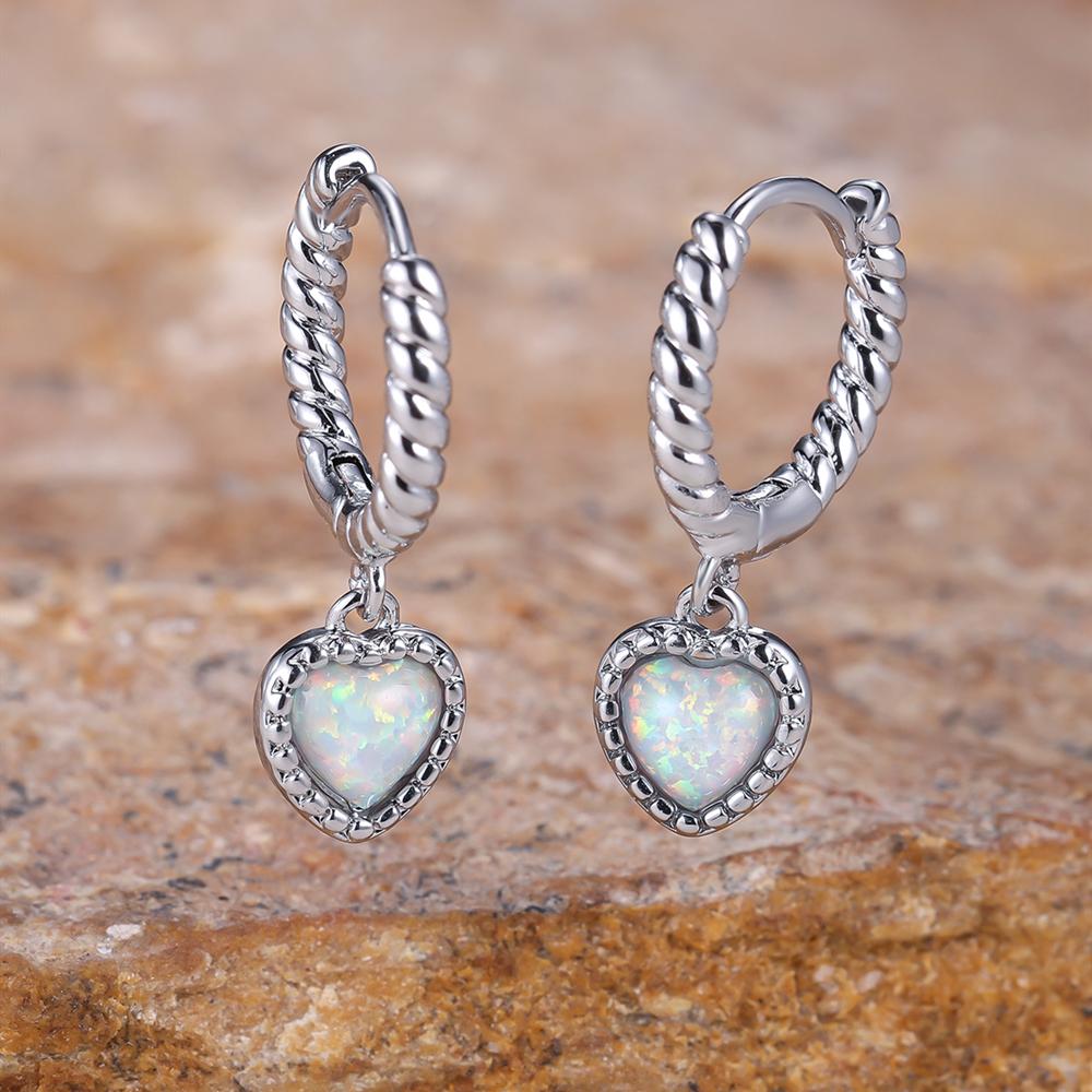 Простые женские серьги-капли с сердечками для женщин — фото 2