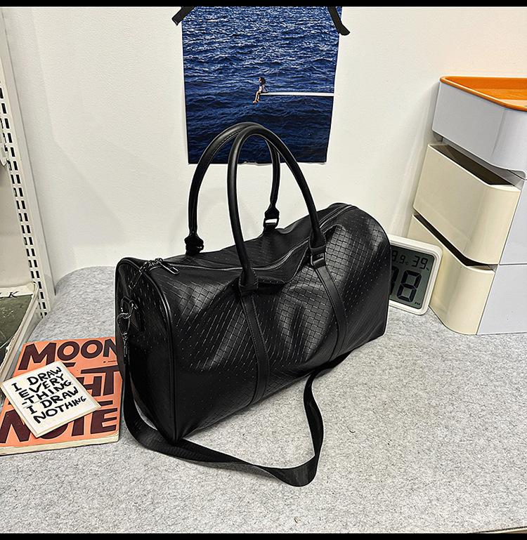 Spring and summer new niche shoulder travel bag large capacity men's and women's tote bag portable pu bag