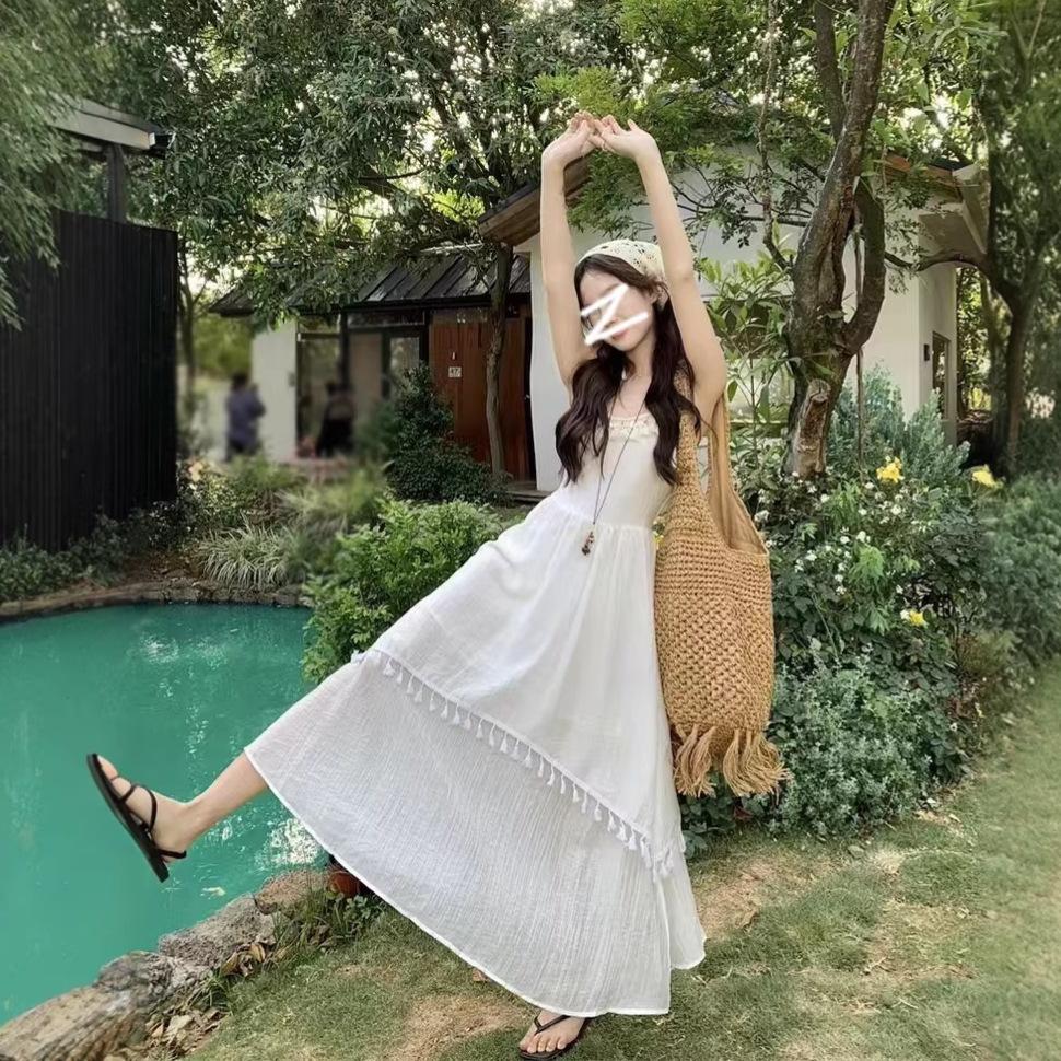 Holiday wind fringe splicing suspender dress women's spring new design feeling waist gentle first love long dress