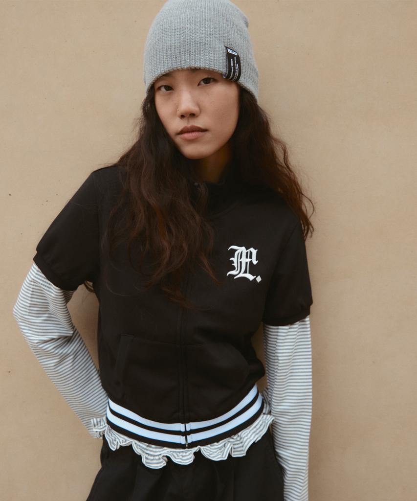 LMC Wm Gothic Football Short Slv Zip-Up Black