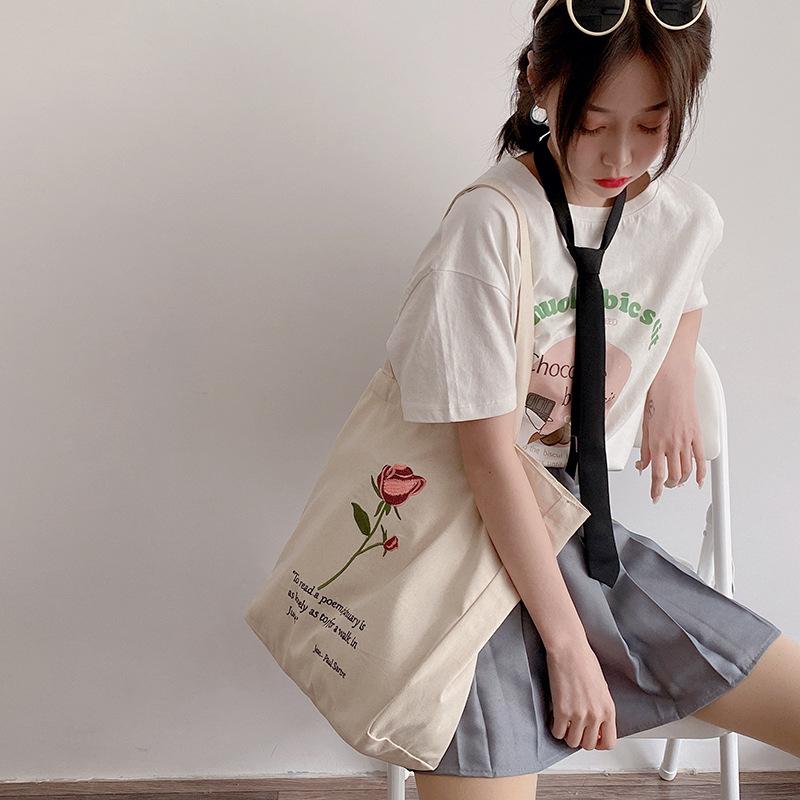 

Women Canvas Shoulder Bag Jean-Paul Sartre Rose Embroidery Shopping Bag Cotton Cloth Handbag Tote Books Bags For College Girls