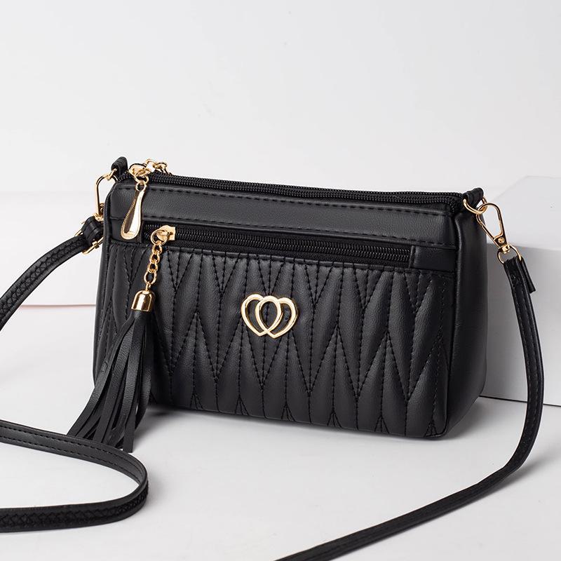 Women's Mini Messenger Bag: High-End Tassel Soft Leather for Middle-Aged Women