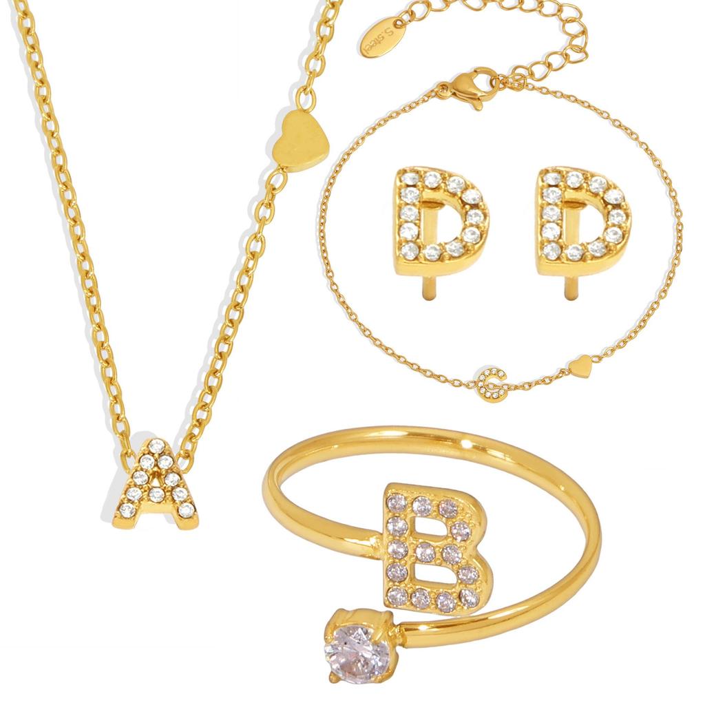 Oumeika Titanium Steel Jewelry Set: 26 Zircon-Inlaid Letters, PVD Gold-Plated Necklace, Bracelet, Earrings, and Ring.