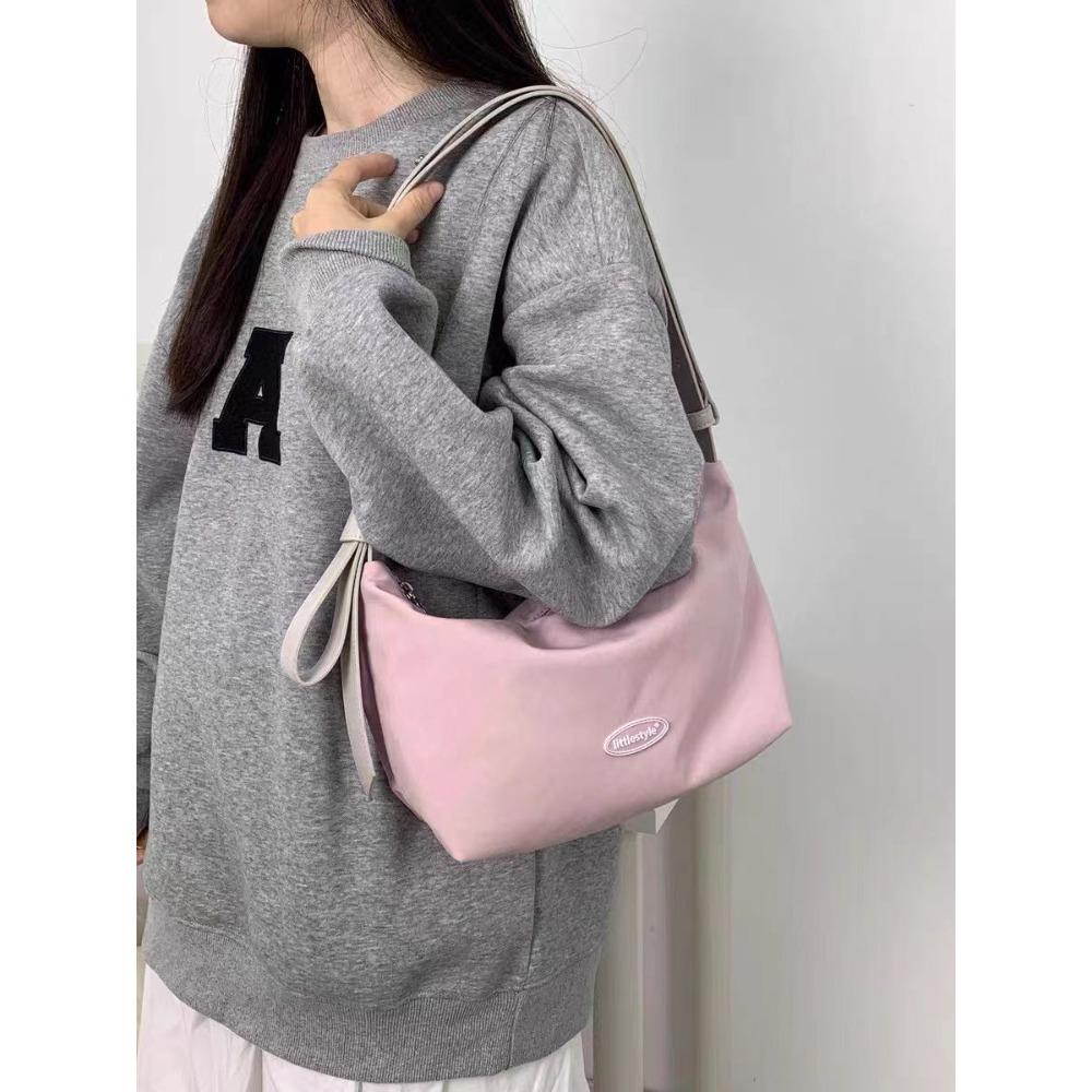 

Summer Japanese casual messenger bag women s niche commuter women s bag shoulder bag underarm bag large capacity student tote bag рожевий