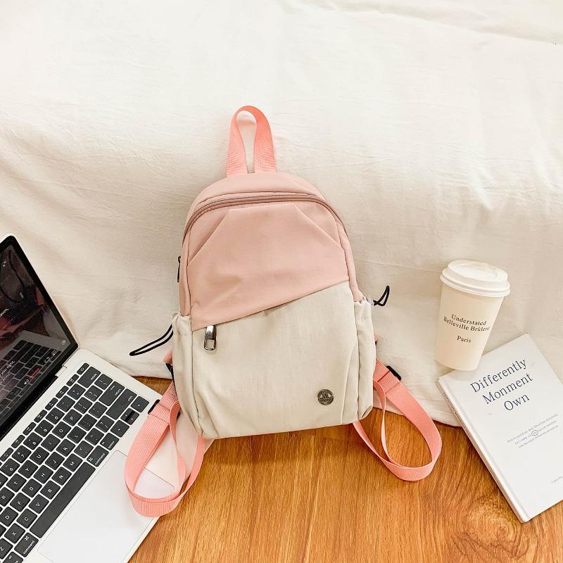 Niche design contrasting color backpack women's new lightweight fashion student bag multifunctional backpack breast bag