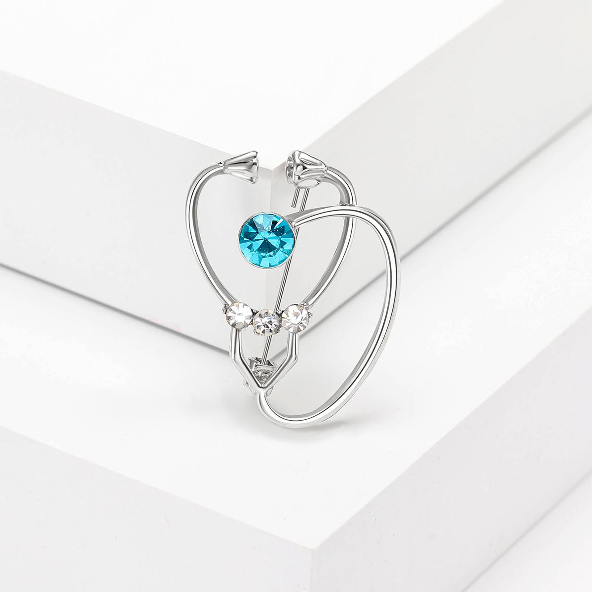 

Мода Творческая личность Доктор Стетоскоп Брошь Простые аксессуары для одежды Кардиган Анти-свет Корсаж