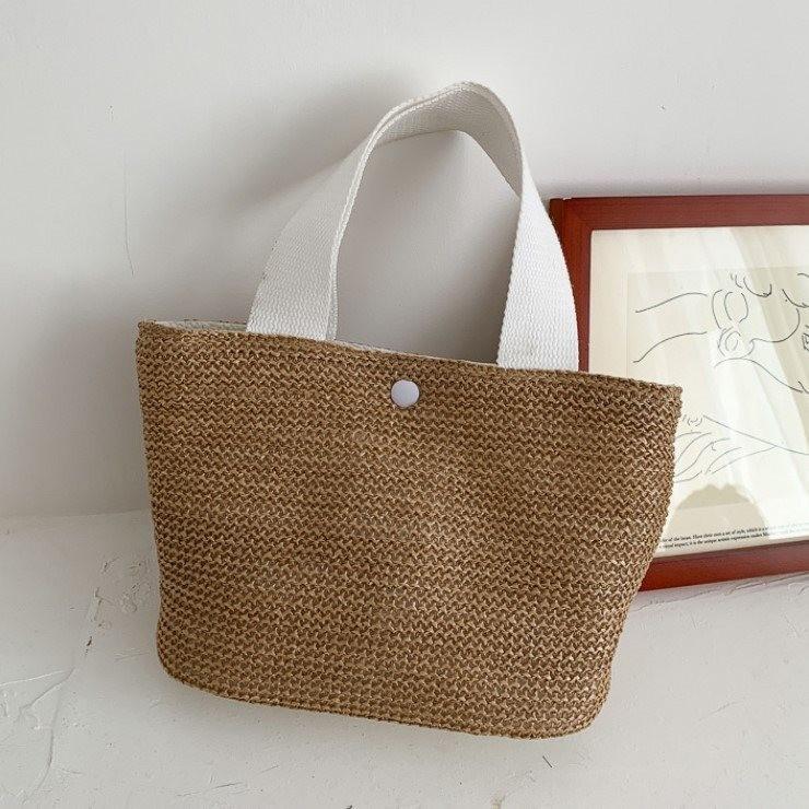 

Trendy Soft Bucket Bag Made From Straw With Magnetic Closure Perfect For Everyday Use