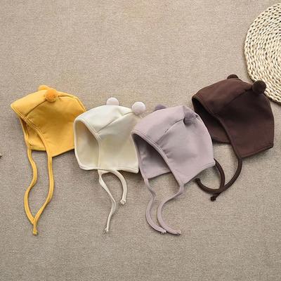 Niedliche kleine Pompom-Babymütze Einfarbig Neugeborener Junge Mädchen Ohrenschutzmütze Frühling Herbst Kleinkind Schnürung Warme Mütze