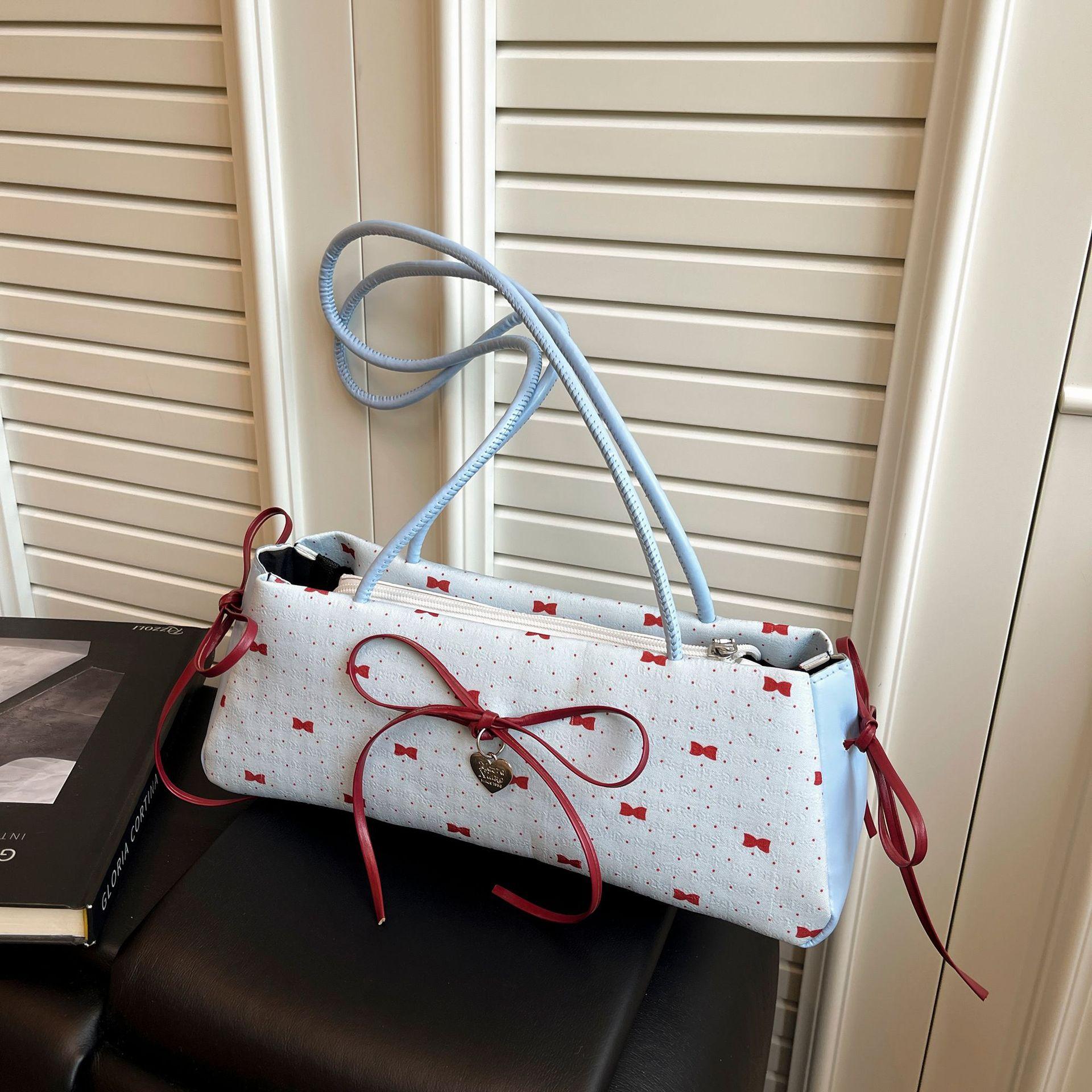 

Contrasting color large-capacity bag women s summer new armpit bag fashionable and simple portable casual versatile shoulder bag синій