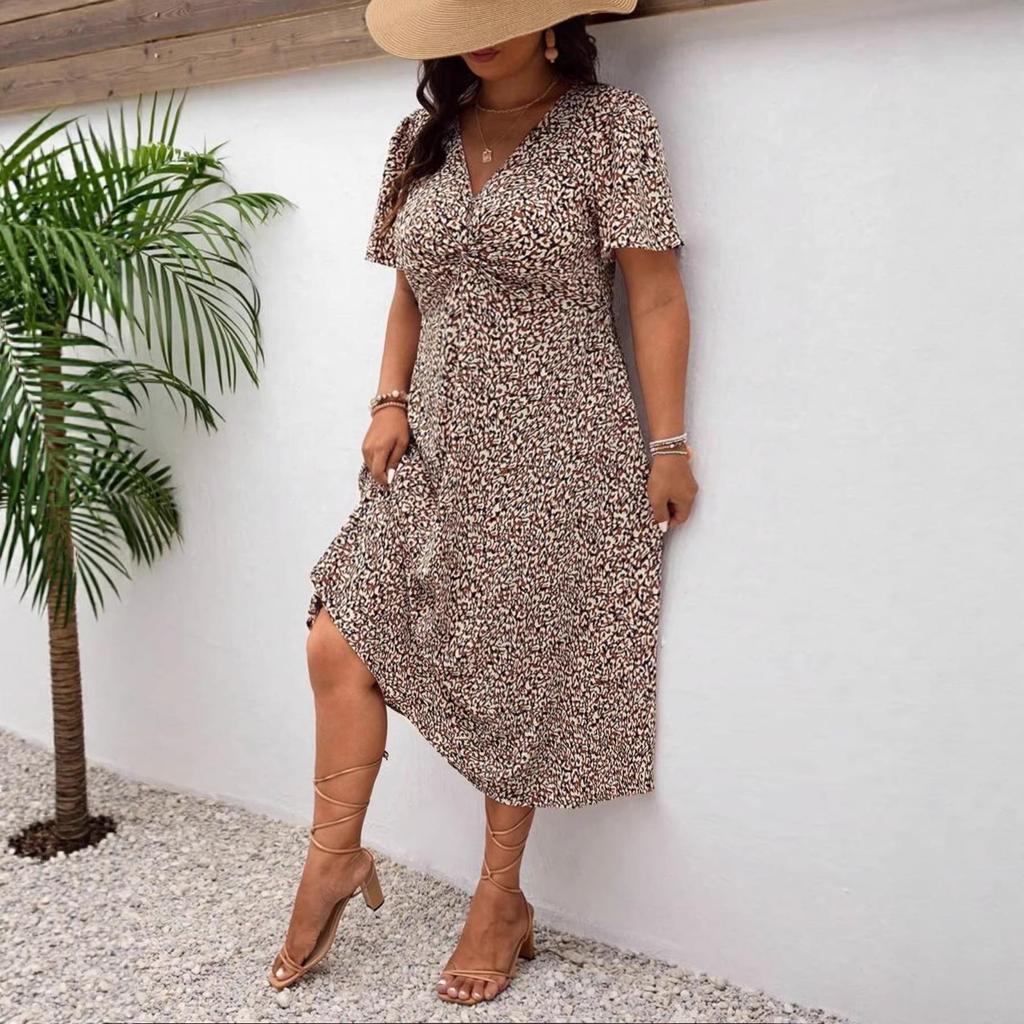 Elegantes Übersee-Leopardenmuster Übergrößenkleid - Damen Kurzarm Verdrehtes Design