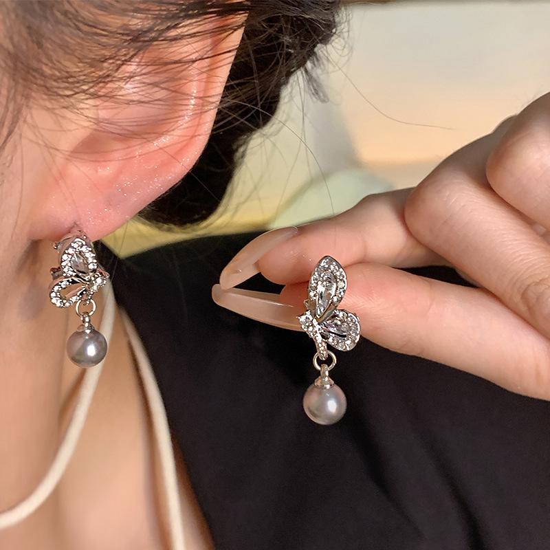 2025 Trendy Korean Micro-Inlaid Zircon Bow Earrings with S925 Silver Needle and Pearl for Women