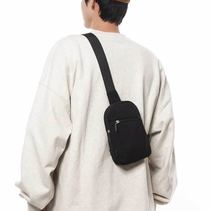 Large capacity messenger bag breast bag men's 2025 new couple casual fashion shoulder bag cycling sports backpack women's tide