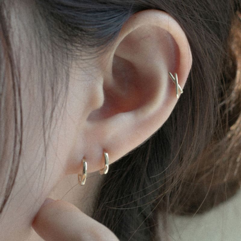 youngglow 14k cross x piercing