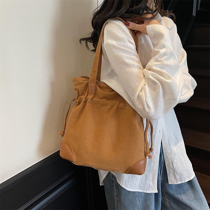 Casual Lazy Wind Simple Capacity Canvas Bag Women 2025 New Simple Korean Version Versatile Shoulder Bucket Bag
